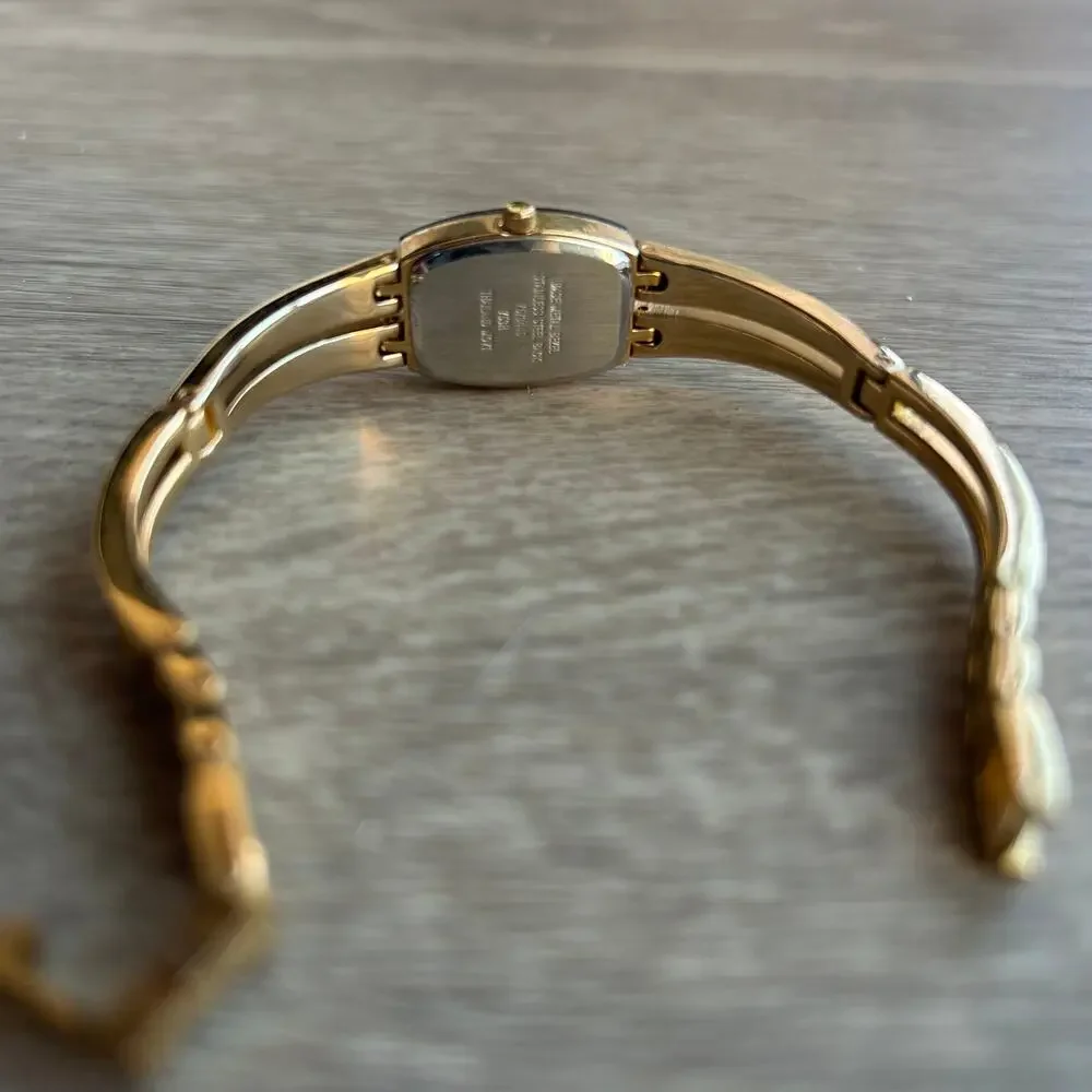 Armitron Diamond Now Blue Dial Gold Tone Bangle Watch